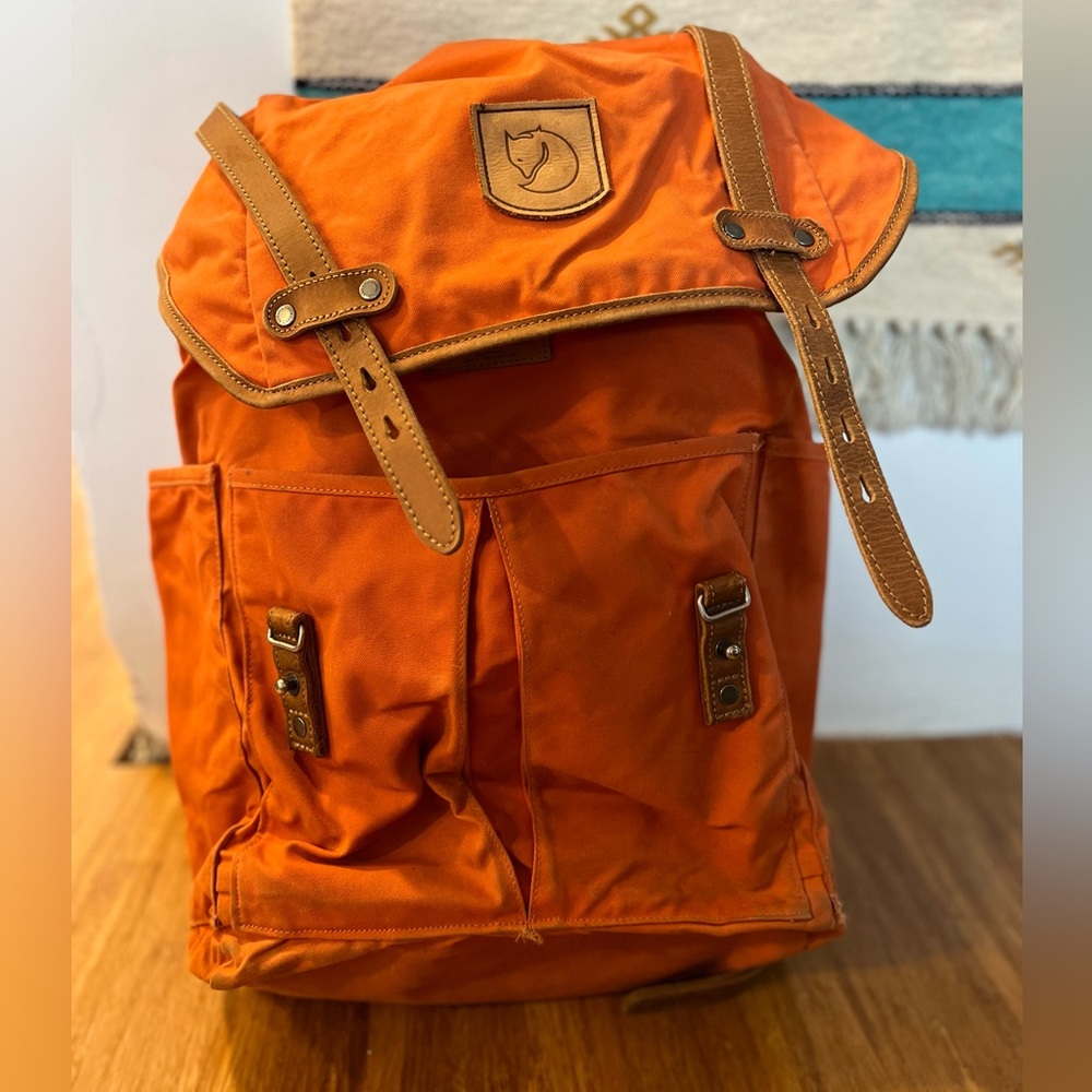 Fjallraven orange and leather backpack